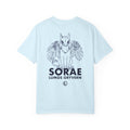 The thtgrlreads Kindred's Curse Saga Comfort Colors graphic tee features a light blue 100% ring-spun cotton base with a black line art print of a winged gryvern and bold text, officially licensed by Penn Cole and available through Printify in the Tees collection.
