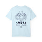 The thtgrlreads Kindred's Curse Saga Comfort Colors graphic tee features a light blue 100% ring-spun cotton base with a black line art print of a winged gryvern and bold text, officially licensed by Penn Cole and available through Printify in the Tees collection.
