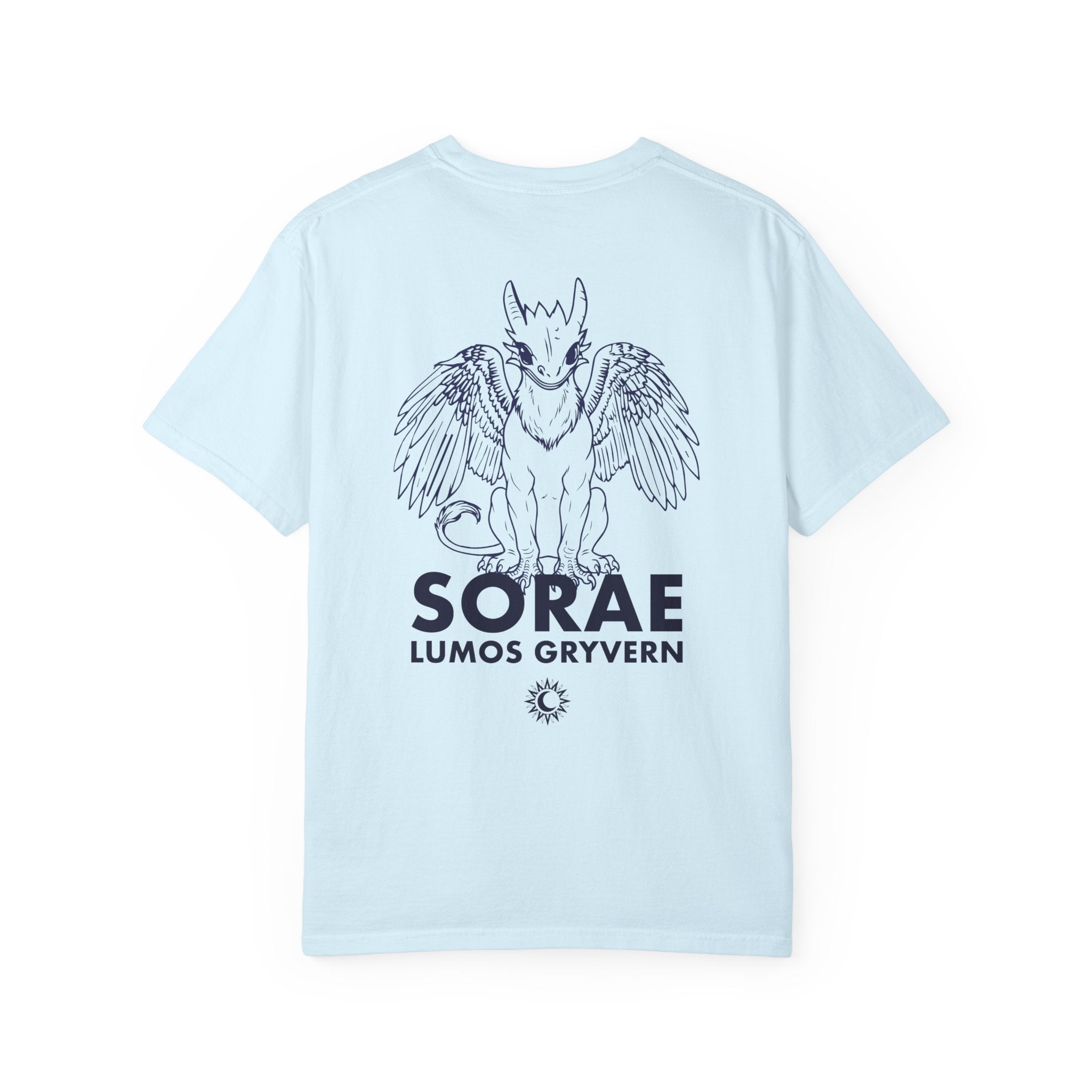 The thtgrlreads Kindred's Curse Saga Comfort Colors graphic tee features a light blue 100% ring-spun cotton base with a black line art print of a winged gryvern and bold text, officially licensed by Penn Cole and available through Printify in the Tees collection.