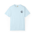 A light blue Comfort Colors graphic tee from thtgrlreads featuring a small black sun and crescent moon design inspired by the Kindred's Curse Saga by Penn Cole, available through Printify in the Tees collection.