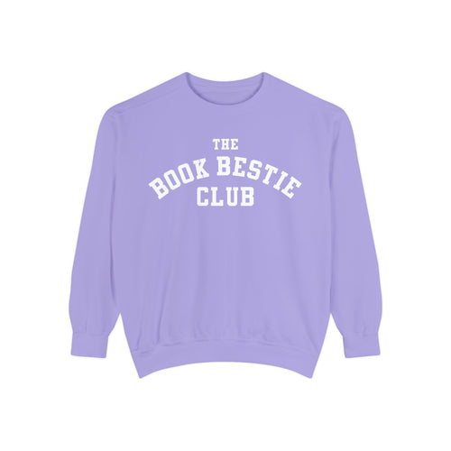 A lavender oversized crewneck sweatshirt from thtgrlreads featuring white collegiate-style text reading "THE BOOK BESTIE CLUB," part of the Book Bestie and Crewnecks collections.